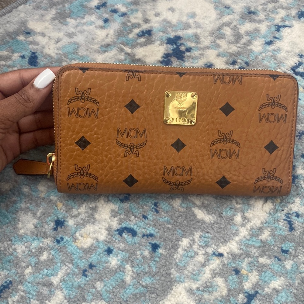 Authentic brown leather MCM logo wallet with gold hardware